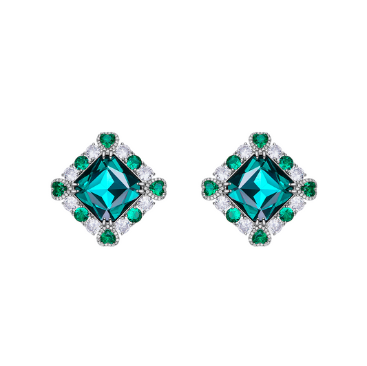 diamond shape earrings with emerald accents